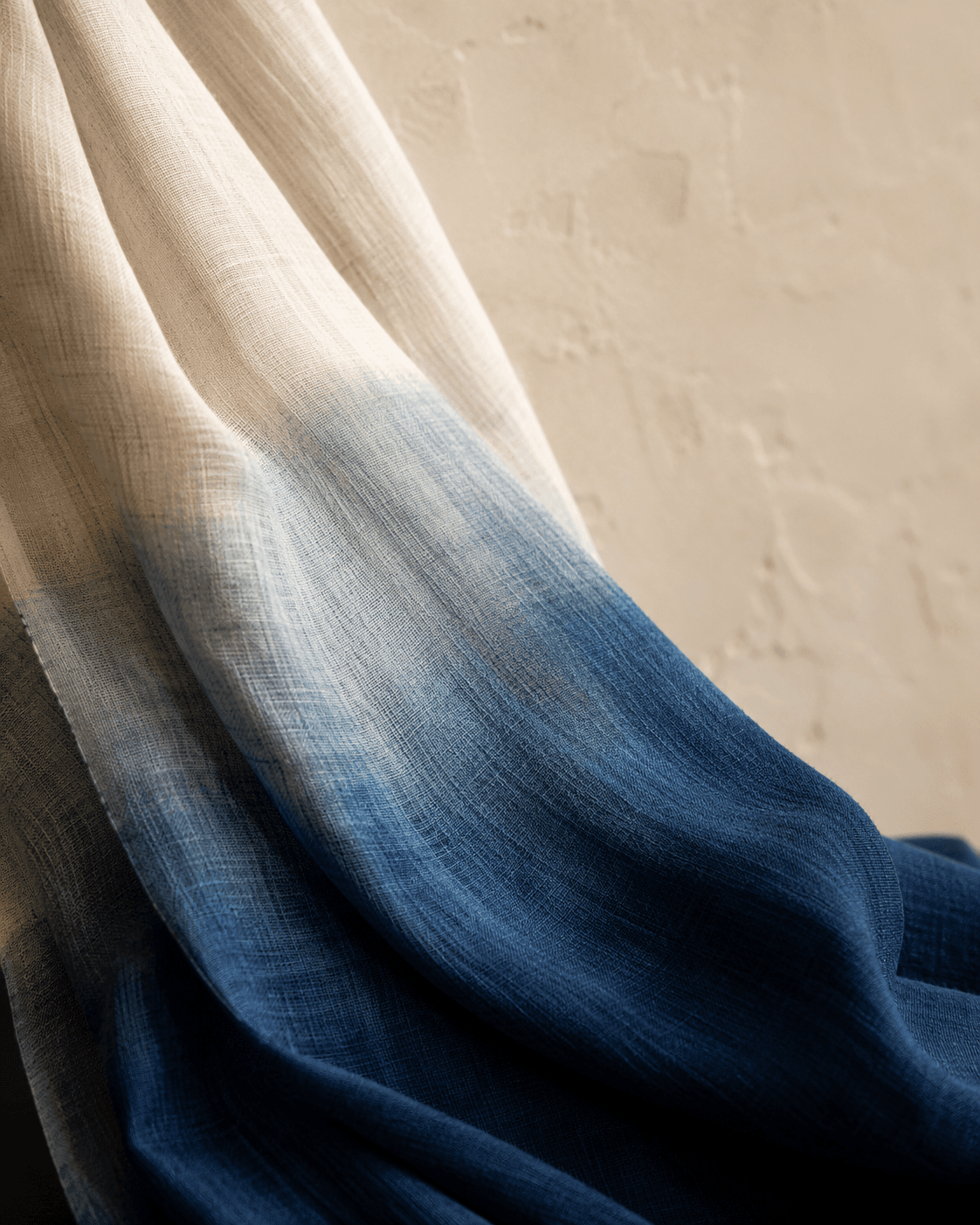 Linen moving from natural white into deep indigo