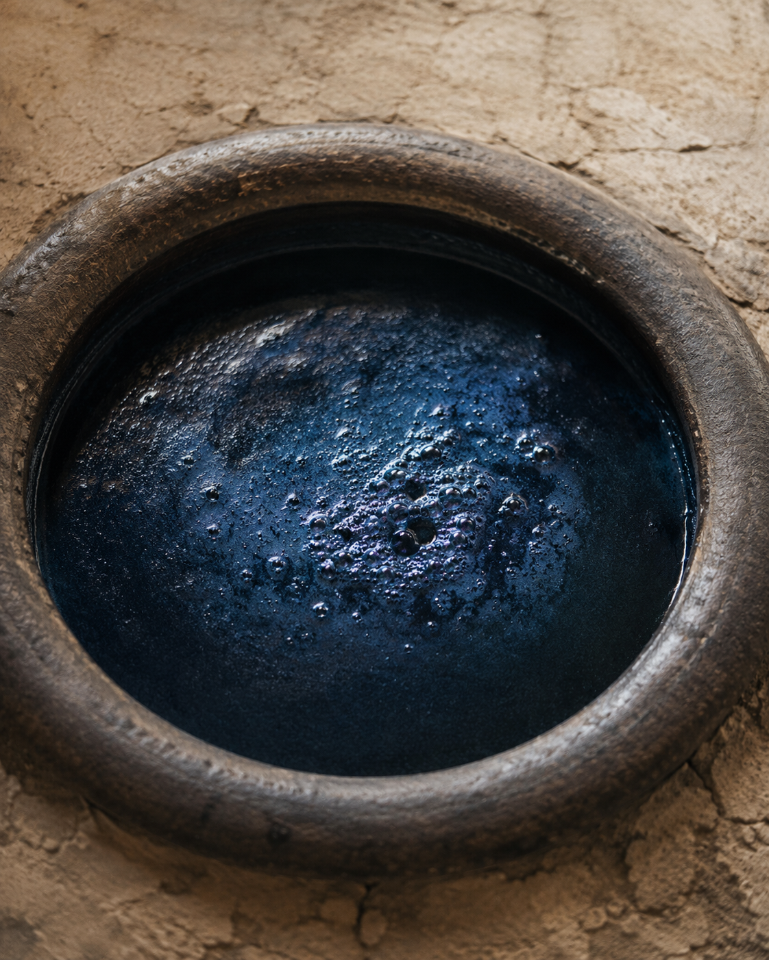 Bloom on the surface of an indigo vat